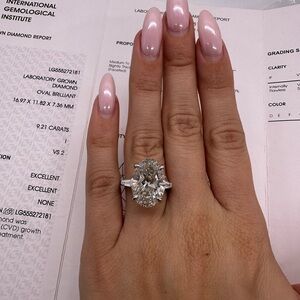 9.21 carat i vs2 oval diamond engagement ring tapered baguettes three stone
